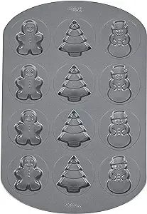 Wilton Non-Stick Christmas Cookie Shapes Pan, 12-Cavity (Gingerbread Man, Tree, Snowman)Wilton Non-Stick Christmas Cookie Shapes Pan, 12-Cavity (Gingerbread Man, Tree, Snowman)